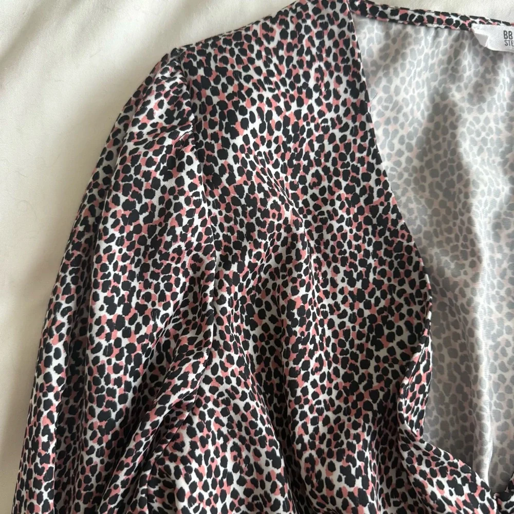 Cheetah Print Peplum Long Sleeve Blouse - Picture 7 of 10